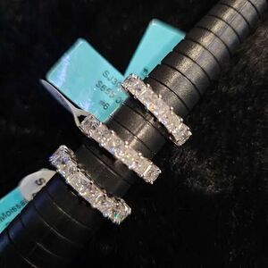 6.3CTW Moissanite Eternity band in .925 Priced as each. Size 6, 7, and 8 avail.